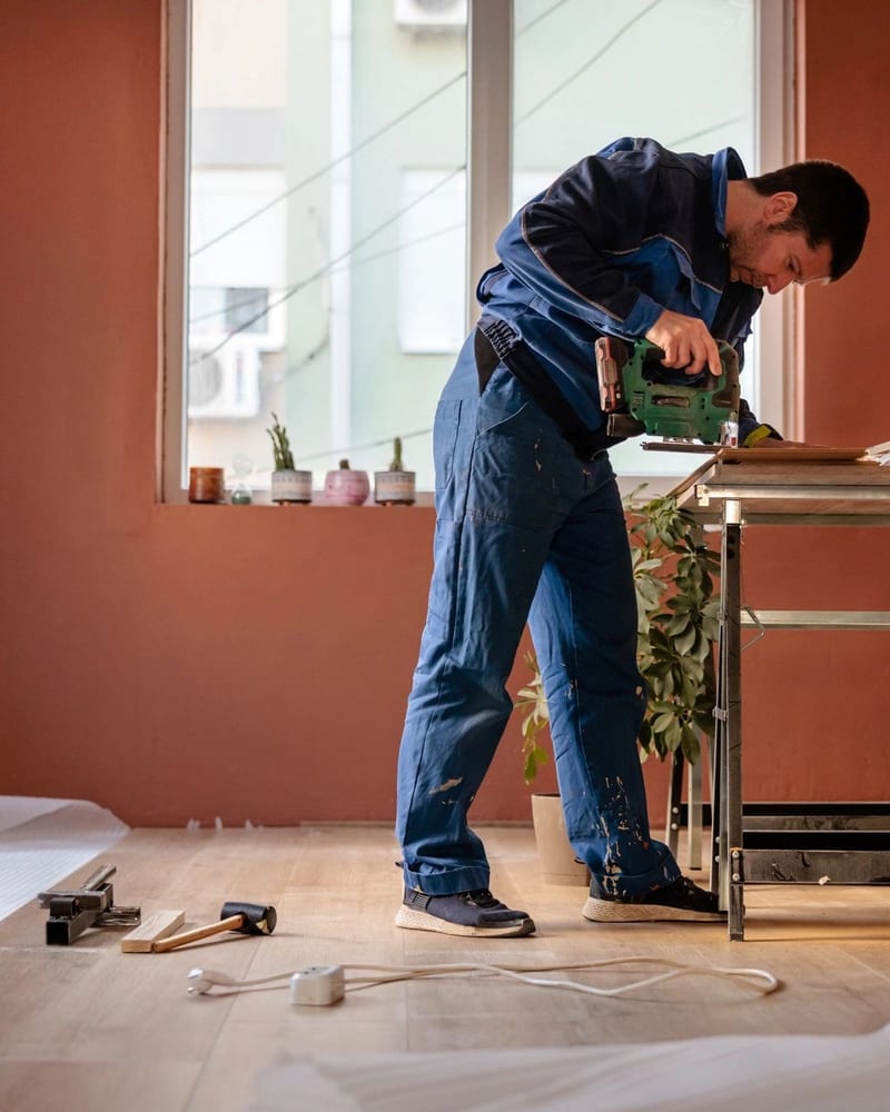 Skilled contractor at work in a beautifully renovated space